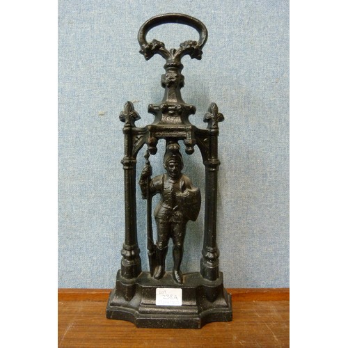 238A - A Victorian cast iron figural door porter