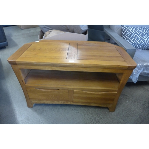 1598 - An oak corner TV stand