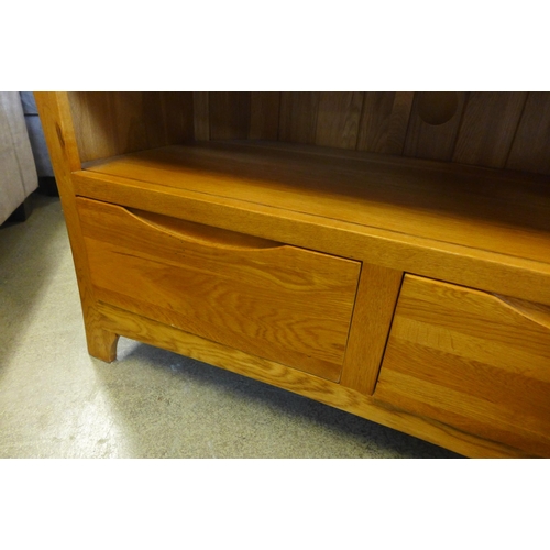 1598 - An oak corner TV stand