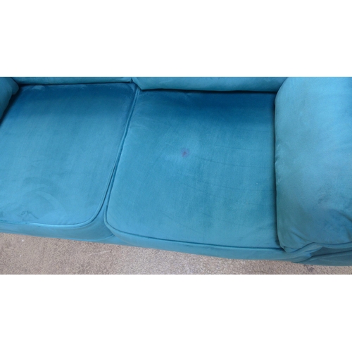 1605 - A Hoxton teal velvet upholstered two seater sofa - marked cushion