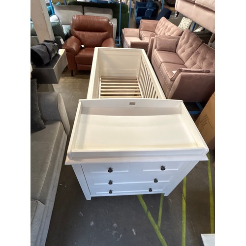 1522 - A Silver Cross white painted cot bed and two over three chest of drawers