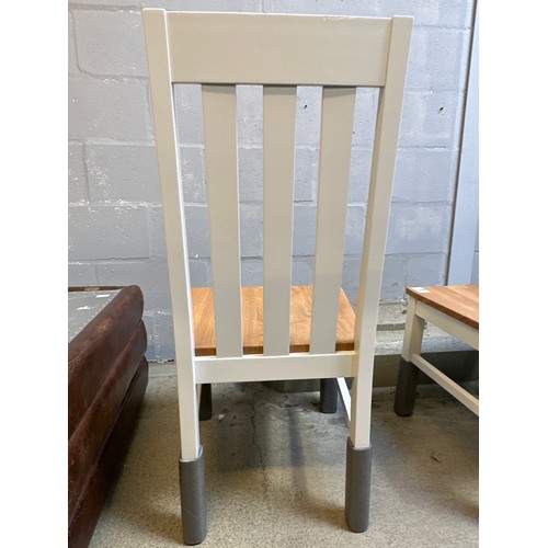 1603 - A pair of white painted and oak dining chairs