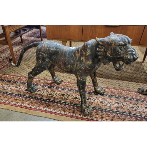 368 - A pair of large oriental bronze figures of tigers, 60cms h x 113cms l