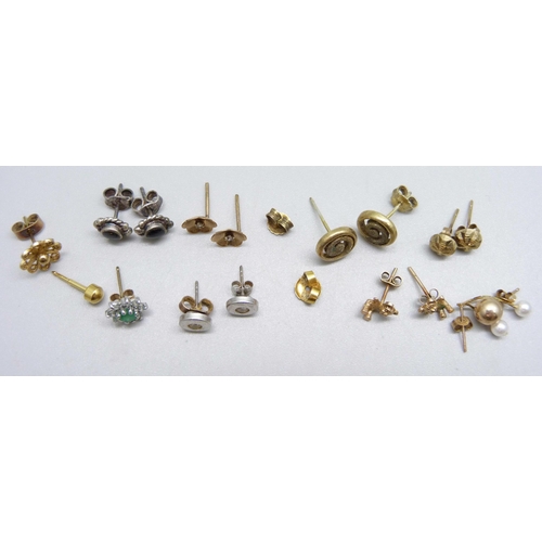 1006 - Six pairs of earrings and five single earrings, including one pair marked 9ct gold, 0.5g, and one si... 