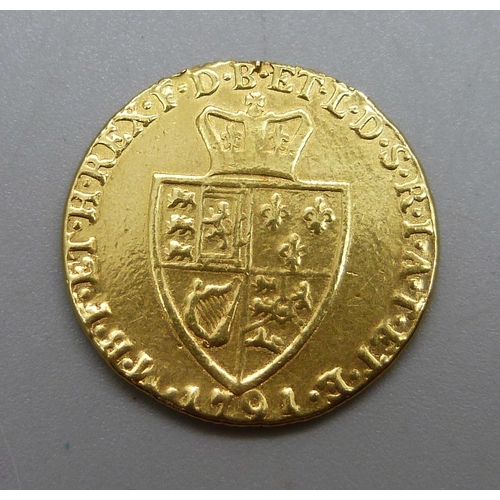 1063 - A George III 1791 gold spade guinea, (previously mounted)