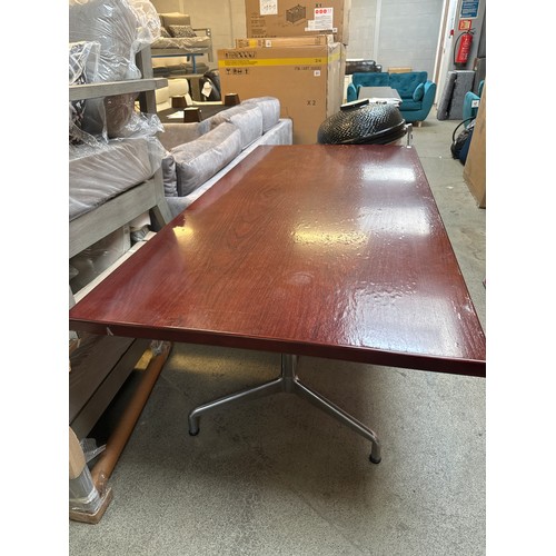 1594 - A rosewood effect dining table with metal base