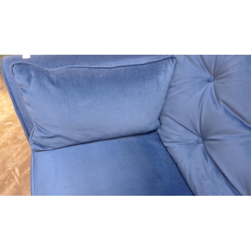 1310 - A Hoxton blue velvet three seater sofa RRP £799