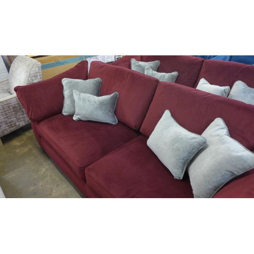 1329 - A Barker and Stonehouse mulberry velvet upholstered four seater sofa RRP £1699