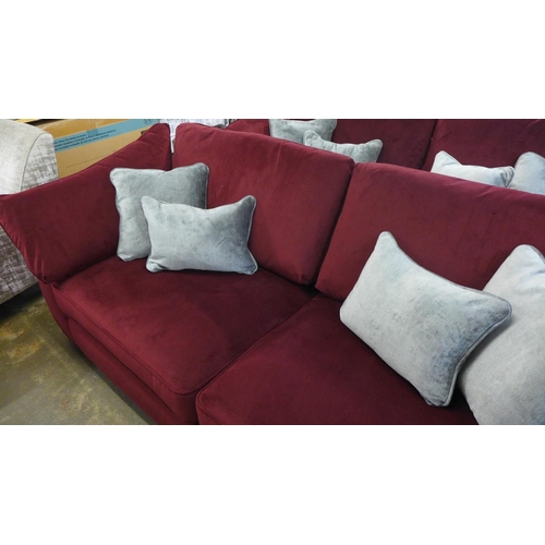 1330 - A Barker and Stonehouse mulberry velvet upholstered four seater sofa RRP £1699