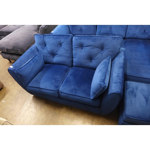 1337 - A Hoxton blue  velvet upholstered two seater sofa and footstool RRP £1238