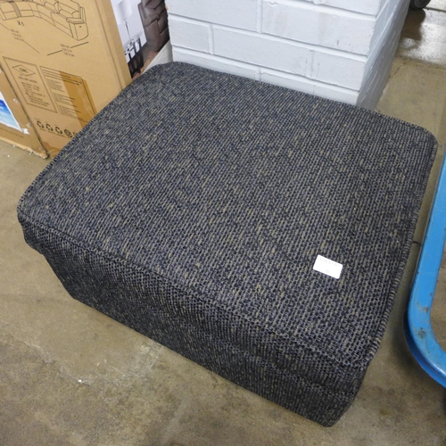 1340 - A black flecked textured weave upholstered ottoman footstool RRP £459, damage to hinge