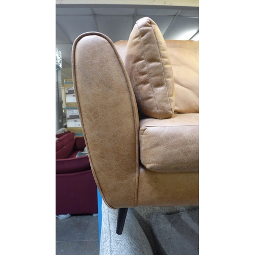 1349 - A vegan tan leather upholstered three seater sofa (some minor marks)