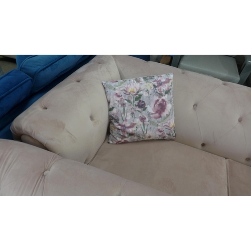 1355 - A cherry blossom velvet upholstered Chesterfield style three seater love seat and pair of footstools