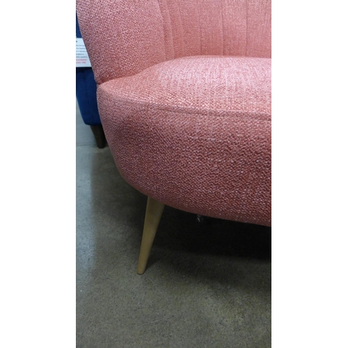 1435 - A bubblegum coral textured weave upholstered shell back side chair