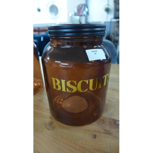 1462 - An amber glass biscuit jar - H 21cms (67825905)