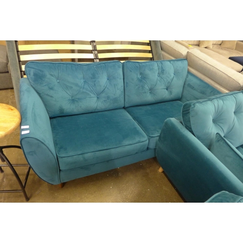 1500 - A Hoxton teal velvet three seater sofa RRP £799