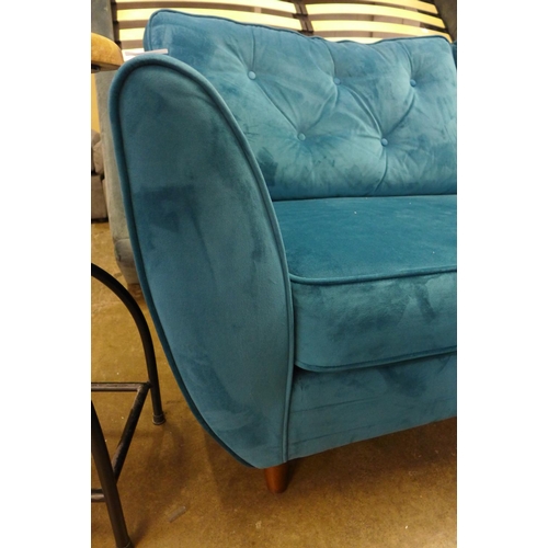 1500 - A Hoxton teal velvet three seater sofa RRP £799