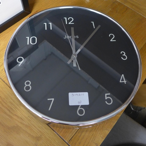 1512 - A silver and black hanging wall clock