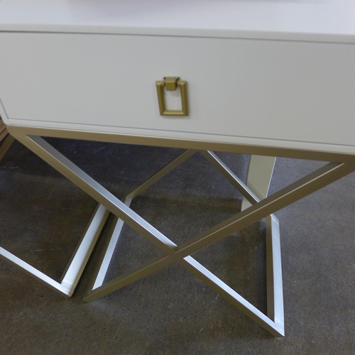 1523 - A pair of white bedside tables with cross legs