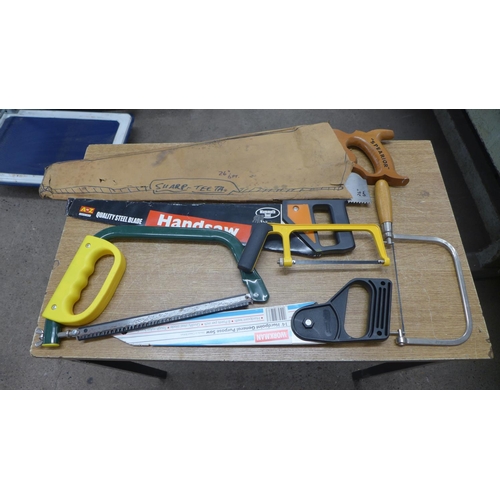 2002 - A large box of assorted saws