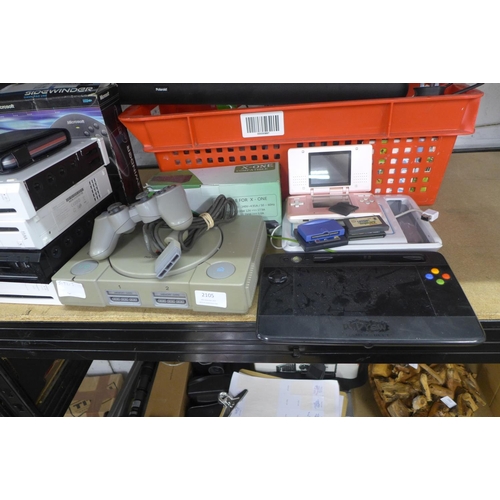 2105 - A box of gaming consoles including 4 Wii consoles a PlayStation 1 and Nintendo ds with assorted game... 