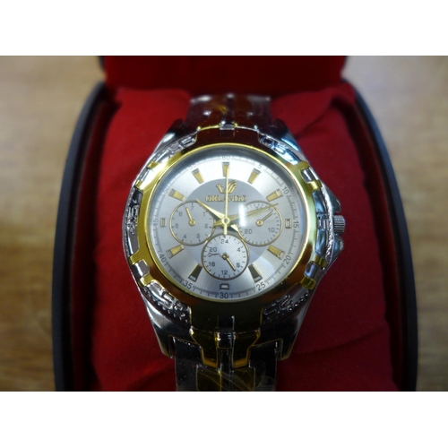 2126 - A two-tone chronograph style men's wristwatch and a silver coloured chronograph style wristwatch