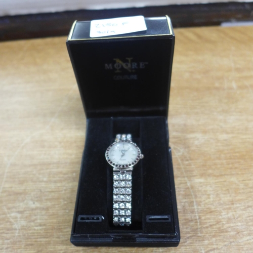 2150F - A lady's N. Moore Couture designer wristwatch