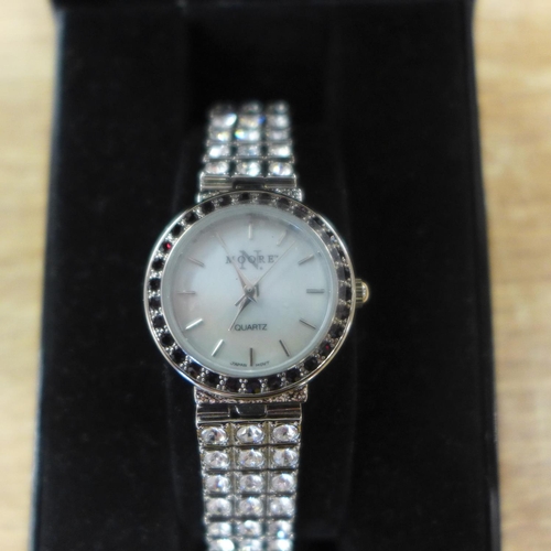 2150F - A lady's N. Moore Couture designer wristwatch