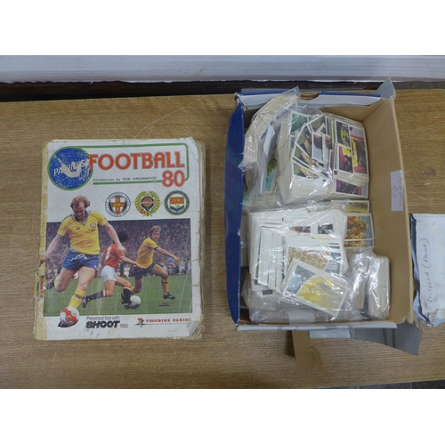 2155 - A box of  figurine panini Football 80 football sticker book- mostly complete and signed by players  ... 