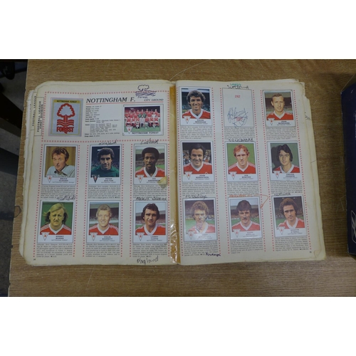 2155 - A box of  figurine panini Football 80 football sticker book- mostly complete and signed by players  ... 