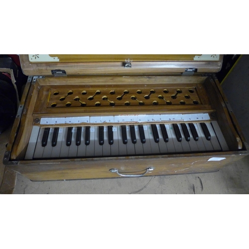 2163 - An Indian squeeze box organ