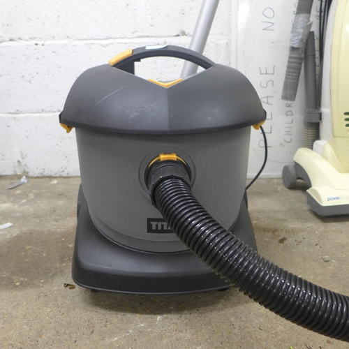 2205 - A Titan 800w vacuum cleaner with attachments (model:- TTB671)