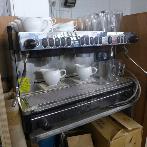 2215 - A La Cimbali M29-Selectron coffee machine complete with cups, saucers, latte glasses and a metal sta... 