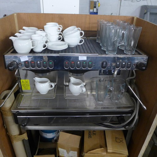 2215 - A La Cimbali M29-Selectron coffee machine complete with cups, saucers, latte glasses and a metal sta... 