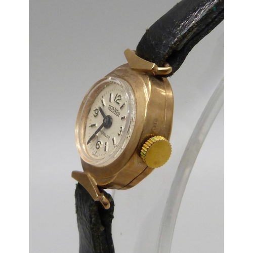 1010 - A lady's 9ct gold cased Roamer wristwatch and a 9ct gold bracelet strap, strap a/f and 6.7g