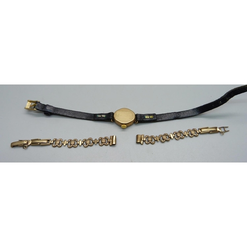 1010 - A lady's 9ct gold cased Roamer wristwatch and a 9ct gold bracelet strap, strap a/f and 6.7g