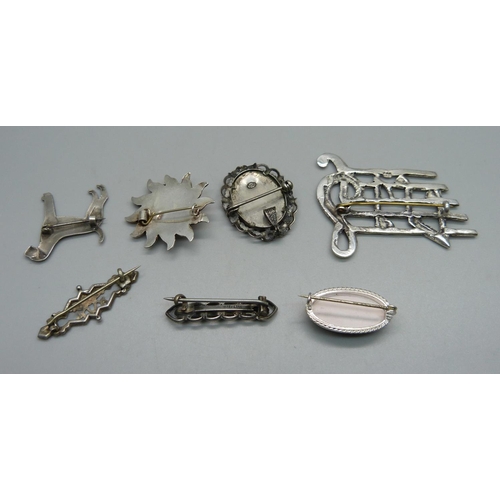 1028 - Seven silver brooches, one with Chester mark, all test as silver, 35g