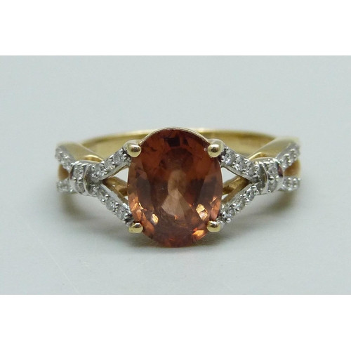 1035 - A 14ct gold Zanzibar sunburst zircon and diamond ring, 3.4g, N