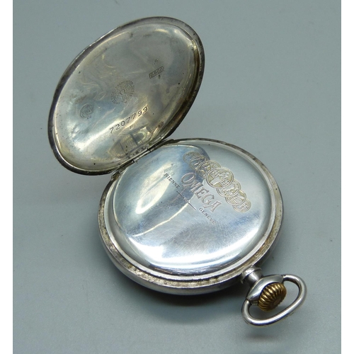 1052 - A .900 silver Omega pocket watch, case stamped Omega, movement stamped Omega, 15 jewels, adjusts to ... 