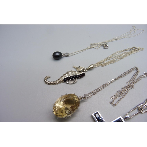 1067 - Five silver pendants and chains, 33g