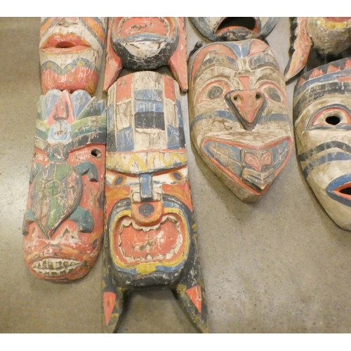 1088 - A collection of carved tribal masks **PLEASE NOTE THIS LOT IS NOT ELIGIBLE FOR POSTING AND PACKING**