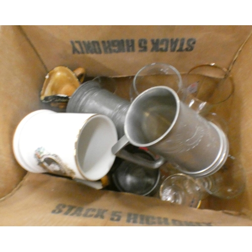 1128 - Three boxes of glassware, plated ware, a tray, steins, crested ware, etc. **PLEASE NOTE THIS LOT IS ... 