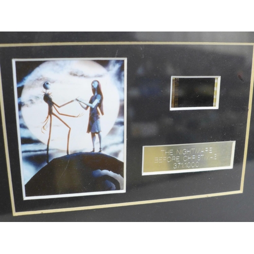 614 - A signed Tim Burton photograph and photographs of films directed by Tim Burton including Beetlejuice... 