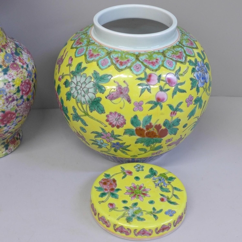 615 - A Chinese lidded jar and a Chinese vase, 24cm