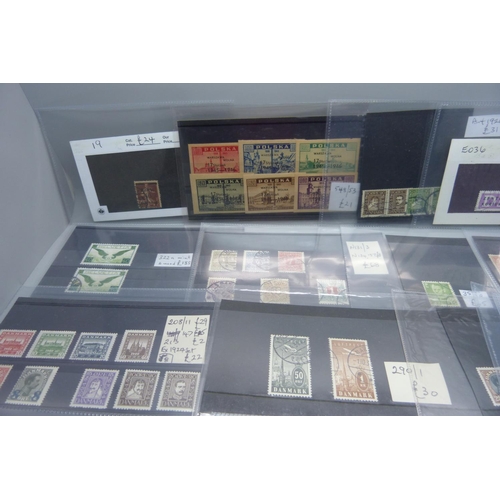 623 - Stamps; better stamps and sets on 32 stockcards, all identified and catalogued at over £1,500