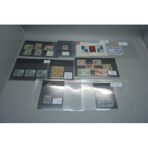 623 - Stamps; better stamps and sets on 32 stockcards, all identified and catalogued at over £1,500