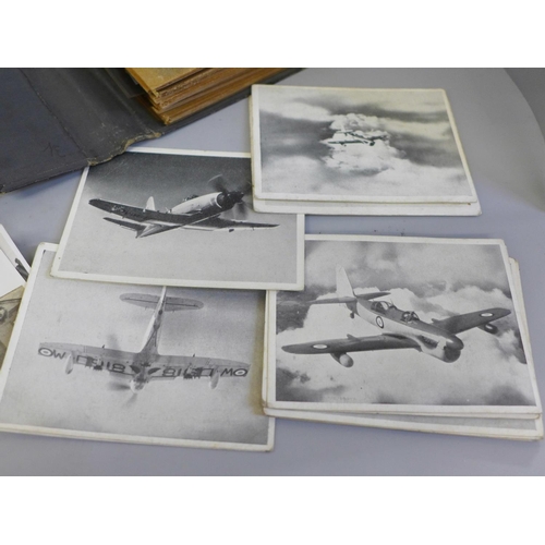 627 - An album of film negatives including warships and military, Singapore 1953 black and white photograp... 