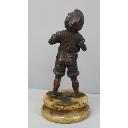 639 - A small cast figure of a bootmaker