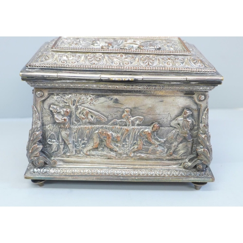 643 - A plate on copper embossed jewellery casket, 14.5cm width