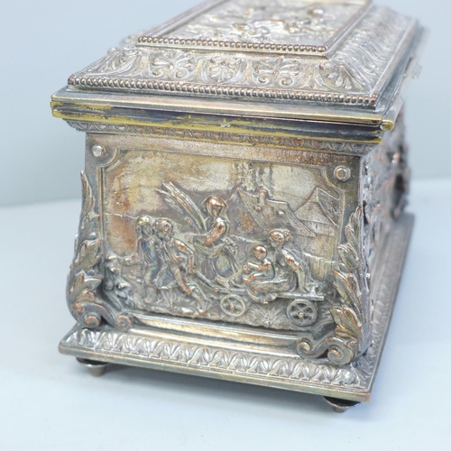 643 - A plate on copper embossed jewellery casket, 14.5cm width